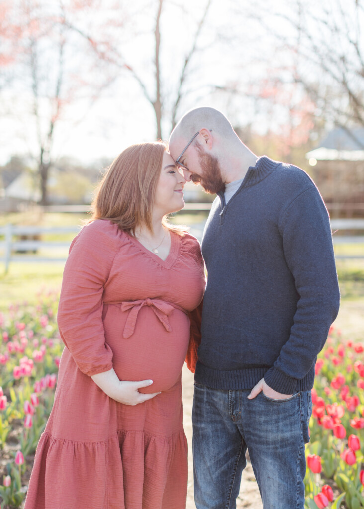 Maternity photos in the field of tulips at Dewberry Farm in Kernersville. Brooke Grogan Photography. 