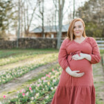 Maternity photos in the field of tulips at Dewberry Farm in Kernersville. Brooke Grogan Photography.