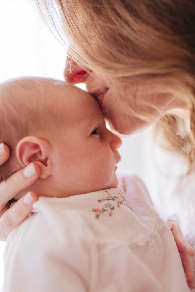 At home newborn family portrait photos. Greensboro North Carolina newborn photographer Brooke Grogan.
