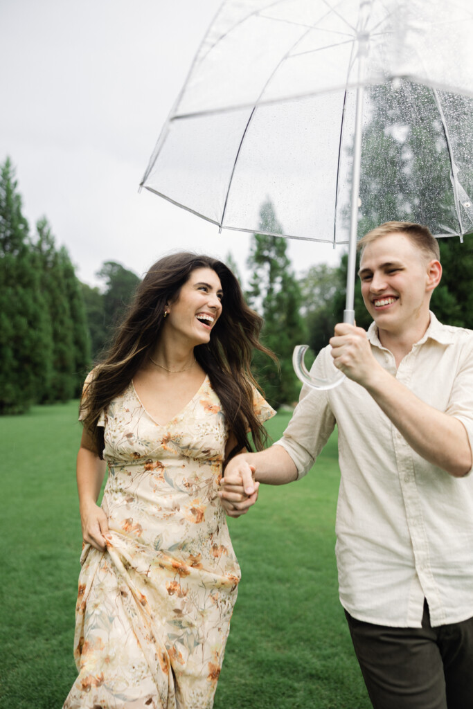 Engaged couple sharing a romantic moment in Reynolda Gardens