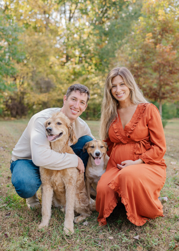 Family portraits in the grass at Price Park, Greensboro NC